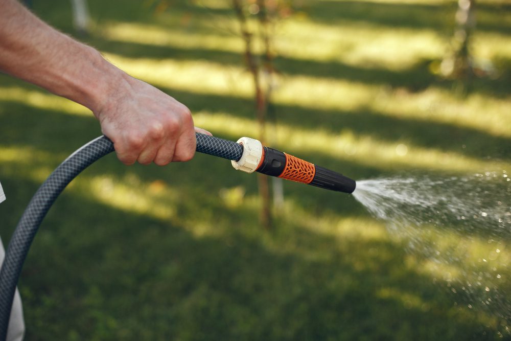 man watering 